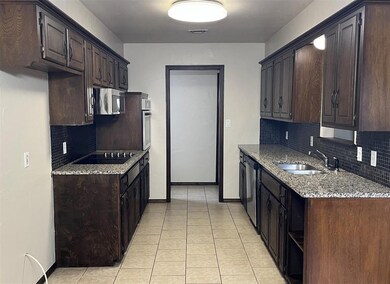 kitchen, from dining room, toward entryway