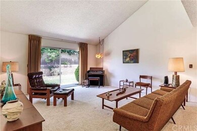 FRONT LIVING ROOM, WITH VAULTED CEILINGS, LIGHT AN