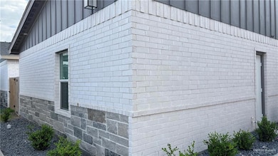 View of side of home with board and batten siding