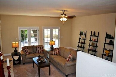 The Family room has two sets of French doors leadi