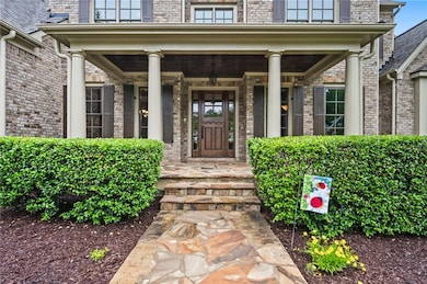 Entrance to property with a porch