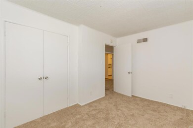 This is the 1st bedroom looking toward the family 