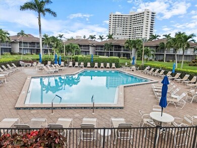Community pool featuring a patio area