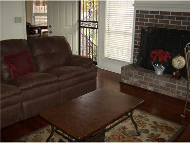 Warm inviting family room with fireplace, ceiling 