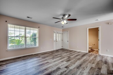 Unfurnished room with hardwood / wood-style floors