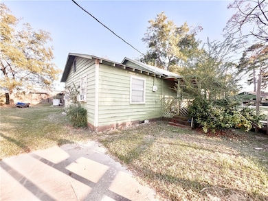 View of front of property featuring fence and a fr