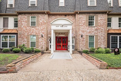 The entrance has a ramp, and a beautiful brick ext