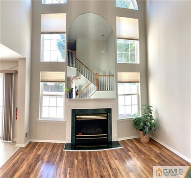 2- Story Family Room w/ Wood Flooring & Firepl