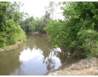Exterior Front. Contraband Bayou on the North side