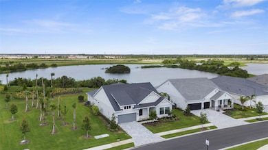 Lake views in back and front of home