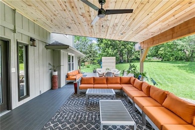 New TimberTech Espresso Legacy deck with cedar accent features including privacy walls and plantar box