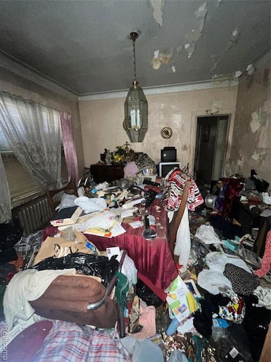 Dining room with radiator heating unit