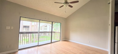 Living area with high ceilings and view of the cou