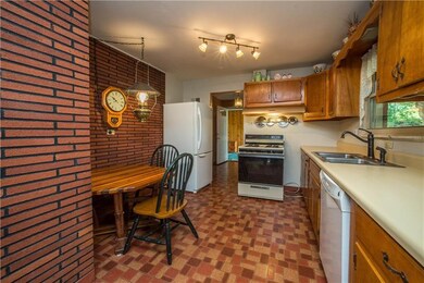 The kitchen has plenty of room for your kitchen ta