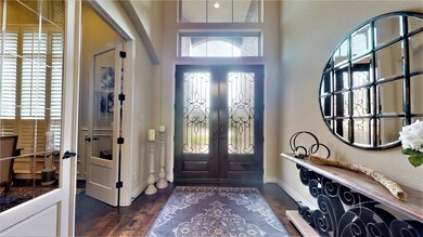 Elegant foyer to welcome your guest into your home. This home features 8' interior doors on first floor, 6