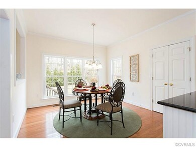 Sunny breakfast area with bar seating & dual-door 