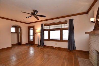 Living room with light filled view of the front yard.