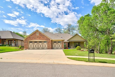 View of front of property with roof with shingles,
