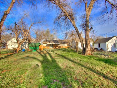 View of yard with an outdoor structure