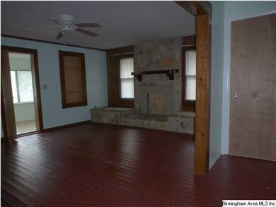 Another view of the living room leading to the sun