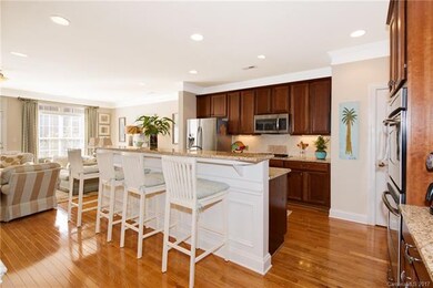 Large Kitchen with eat-in breakfast bar. Cherry ca