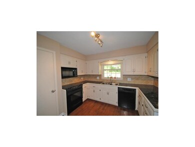 Kitchen with Granite Tile Counter Top