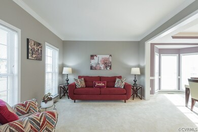 Formal Living Room is open to Formal Dining Room