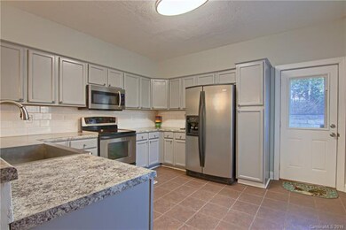 Updated kitchen with stainless appliances