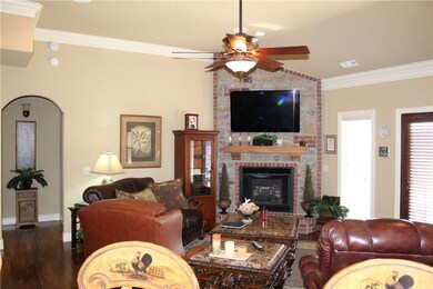 Living Room with brick and rock fireplace.