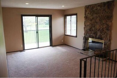 Living room has access to a spacious deck.