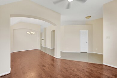 Formal living and dinning with hardwood floor.