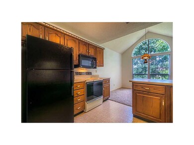 Kitchen. Kitchen features a palladium window in th