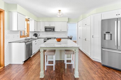 9204 White Oaks Trail, Champlin, MN 55316 - photo 7