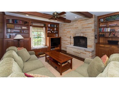 Outstanding family room with cherry built-ins, rec