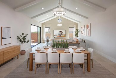 Dining area with vaulted ceiling
