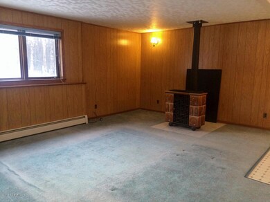 Living Room with coal-burning fireplace