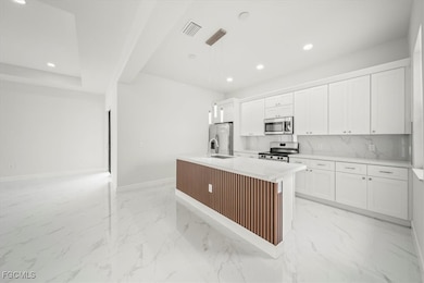 9 NW 14th Place, Cape Coral, FL 33993 - photo 7