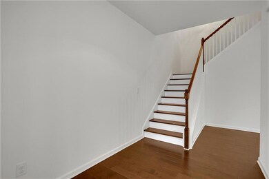 Stairway with wood-type flooring
