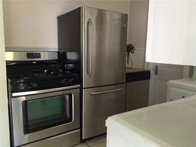 Kitchen featuring stainless steel appliances, lig