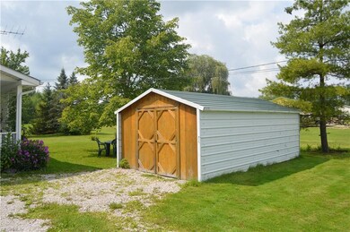Carport w/ door.