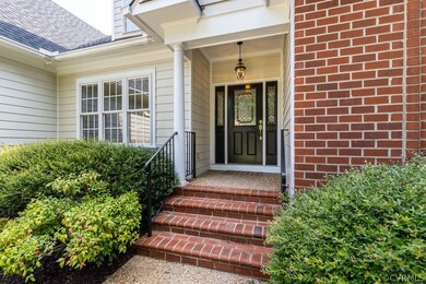Covered front entry with generous stoop and welcom