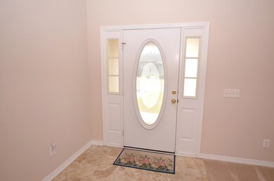 travertine tile entry way; formal living / dining