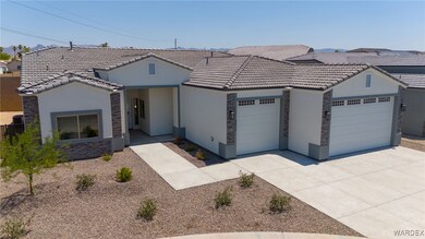 View of front of property with a garage