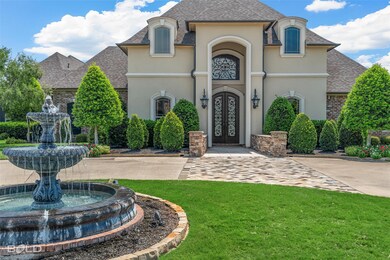 French country style house featuring a three tier 