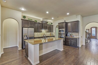 The island kitchen is loaded with upgrades.