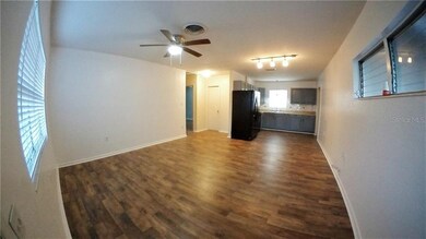 This is the view when you come in the front door. The laminate flooring is brand new as well as the interior paint in the living room and kitchen.
