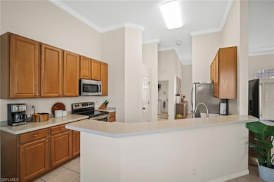Kitchen featuring stainless steel appliances, crow