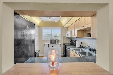 6890 Royal Palm Blvd unit 203H, Margate, FL 33063 - photo 7