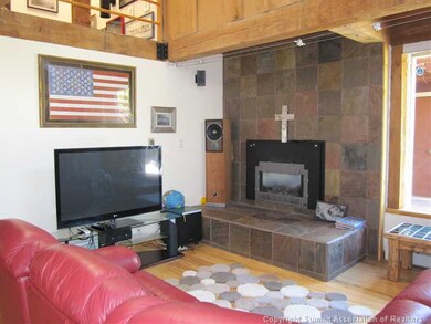 Living Room. Vaulted ceilings in the living room a