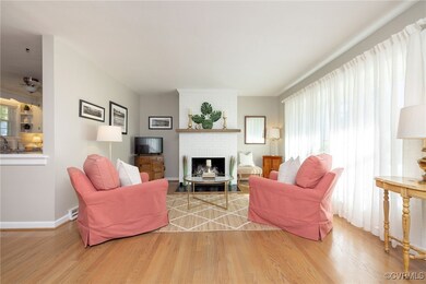 Formal living room with beautifully stained hardwo